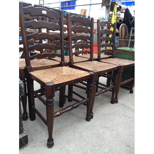 2846 - A SET OF SIX LANCASHIRE STYLE LADDERBACK DINING CHAIRS WITH RUSH SEATS