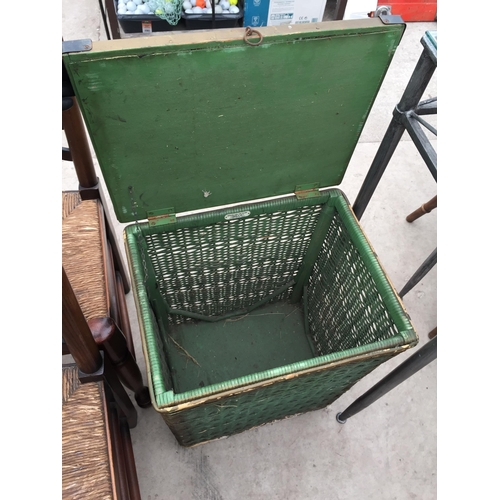 2847 - A LLOYD LOOM STYLE LINEN BASKET AND METAL FRAMED JARDINIER STAND WITH GLASS TOP