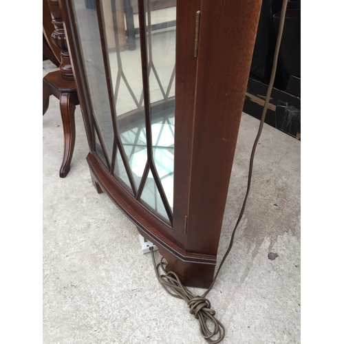 2853 - A MAHOGANY GLASS FRONTED CORNER CUPBOARD