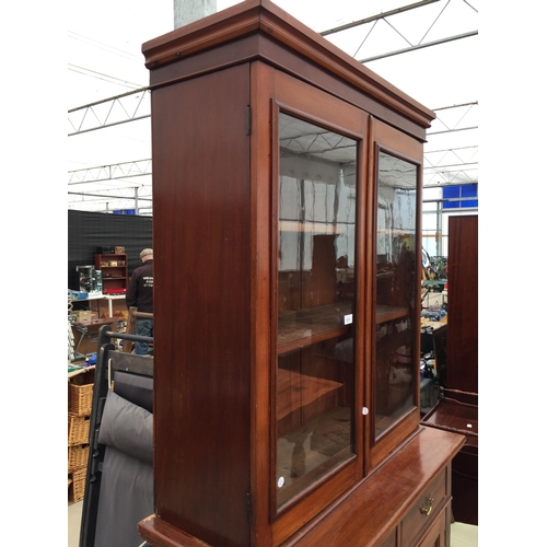 2861 - A LATE VICTORIAN MAHOGANY TWO DOOR BOOKCASE ON BASE, ENCLOSING TWO DRAWERS AND TWO CUPBOARDS, 37