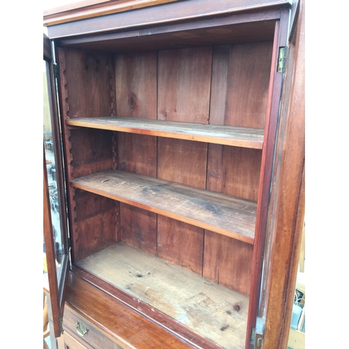 2861 - A LATE VICTORIAN MAHOGANY TWO DOOR BOOKCASE ON BASE, ENCLOSING TWO DRAWERS AND TWO CUPBOARDS, 37