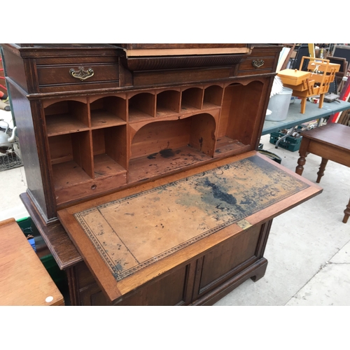 2880 - A LATE VICTORIAN OAK BUREAU BOOKCASE WITH ASTRAGAL GLAZED DOOR, FALL FRONT, CUPBOARDS, DRAWERS AND O... 