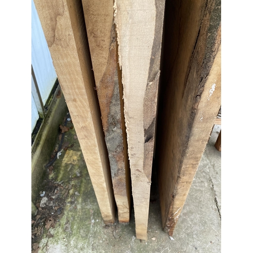 2031 - FOUR LENGTHS OF ROUGH SAWN BEECH (APPROX L:316CM)