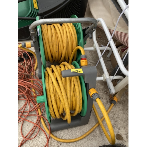 2048 - TWO HOSE PIPE REELS AND AN EXTENSION LEAD