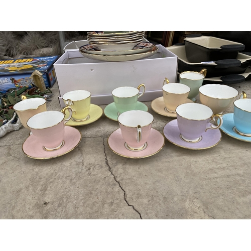 2063 - AN ASSORTMENT OF CERAMICS TO INCLUDE PLATES AND CAPS AND SAUCERS ETC