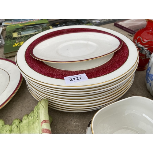 2127 - AN ASSORTMENT OF CERAMICS TO INCLUDE PLATES AND CUPS AND SAUCERS ETC