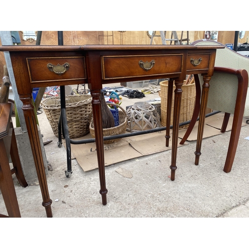 2871 - A REPRODUCTION MAHOGANY BREAKFRONT SIDE-TABLE WITH THREE DRAWERS, ON TURNED AND FLUTED LEGS, 41.5