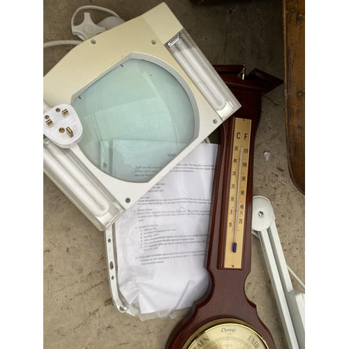 2142 - A WOODEN CASED BAROMETER AND AN ANGLE POISE STYLE MAGNIFIER LAMP