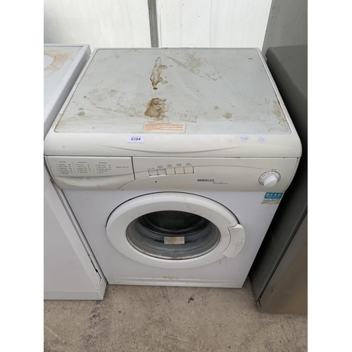 2304 - A WHITE BEKO WASHING MACHINE BELIEVED WORKING ORDER BUT NO WARRANTY