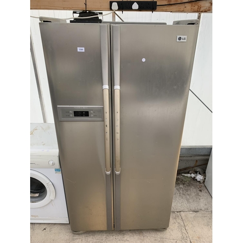 2305 - A SILVER LG AMERICAN STYLE FRIDGE FREEZER