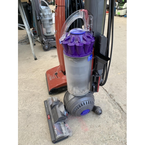 2323 - A DYSON DC40 VACUUM CLEANER AND A FURTHER HOOVER VACUUM CLEANER