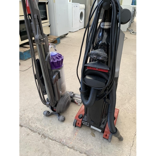 2323 - A DYSON DC40 VACUUM CLEANER AND A FURTHER HOOVER VACUUM CLEANER