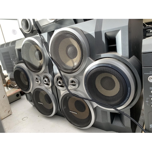 2391 - A SAMSUNG STEREO SYSTEM WITH A SUB WOOFER AND FOUR LARGE SPEAKERS