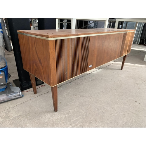 2396 - A RETRO TEAK RADIOGRAM WITH BSR RECORD DECK