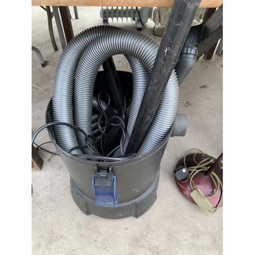 2411 - AN OASE INDUSTRIAL STYLE VACUUM CLEANER