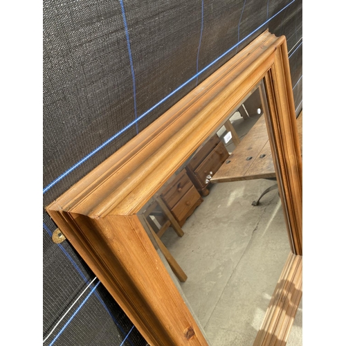 2906 - A MODERN PINE FRAMED WALL MIRROR, 50X40