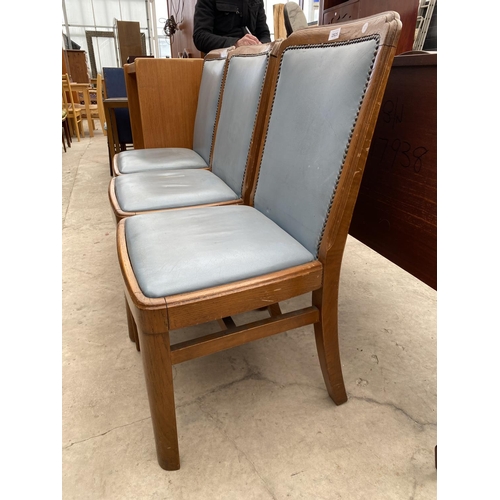 2925 - THREE MODERN OAK FRAMED DINING CHAIRS WITH STUDDED BACKS