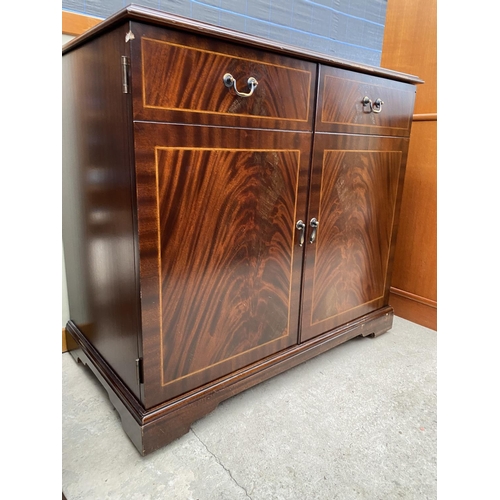 2944 - A MAHOGANY & CROSSBANDED CHARLES SHERATON HI-FI CABINET 33