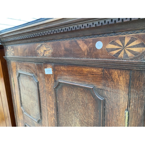 2954 - A GEORGE III OAK AND INLAID CORNER CUPBOARD WITH SHAPED INTERIOR SHELVES 35 INCH WIDE