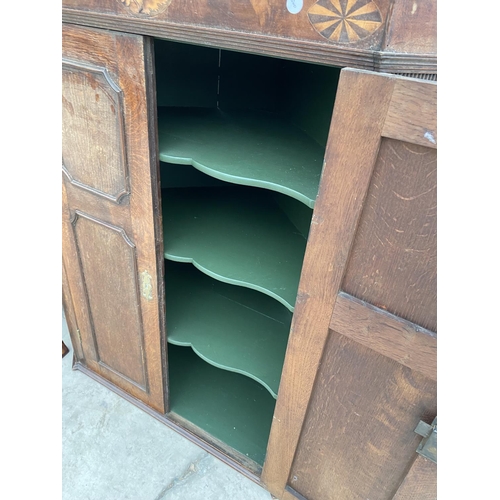 2954 - A GEORGE III OAK AND INLAID CORNER CUPBOARD WITH SHAPED INTERIOR SHELVES 35 INCH WIDE