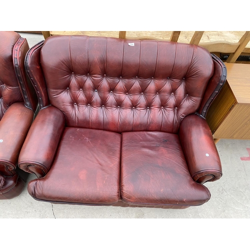 2960 - AN OXBLOOD 2 SEATER BUTTON BACK SETTEE AND 2 EASY CHAIRS