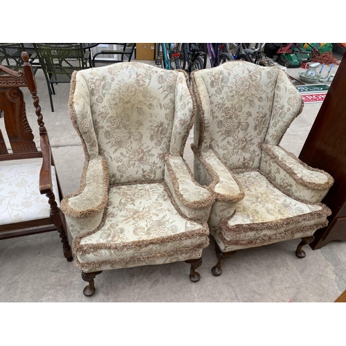 2965 - A PAIR OF GEORGE III STYLE WING BACK LOUNGE CHAIRS ON CABRIOLE LEGS