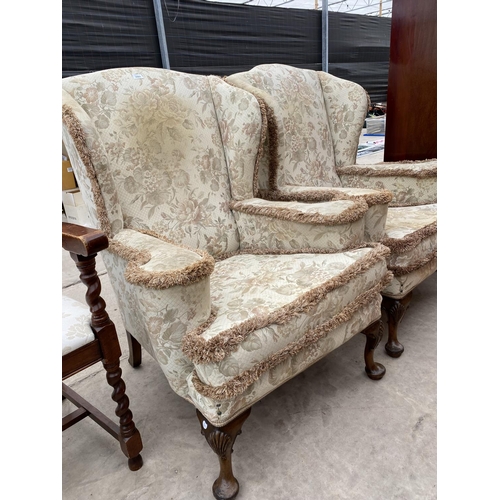 2965 - A PAIR OF GEORGE III STYLE WING BACK LOUNGE CHAIRS ON CABRIOLE LEGS