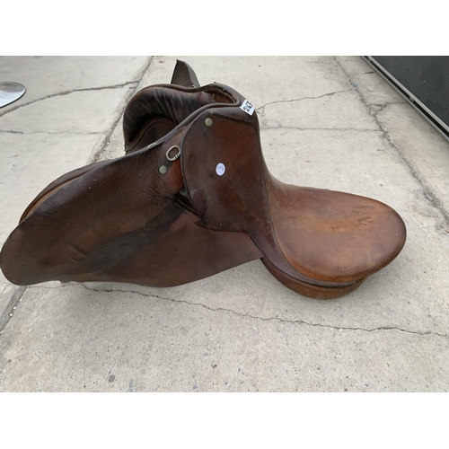 2163 - A VINTAGE LEATHER HORSES SADDLE