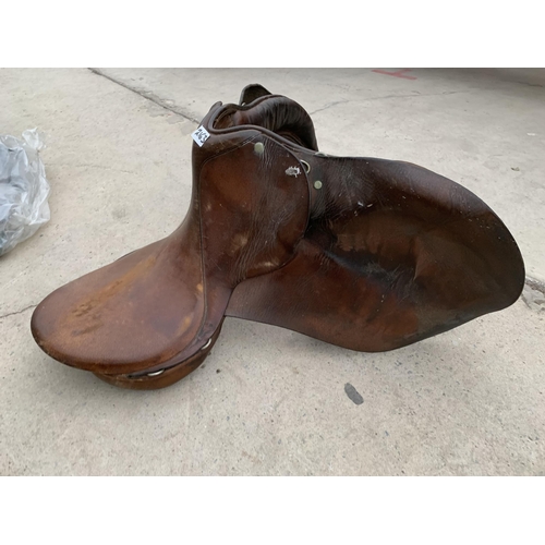 2163 - A VINTAGE LEATHER HORSES SADDLE