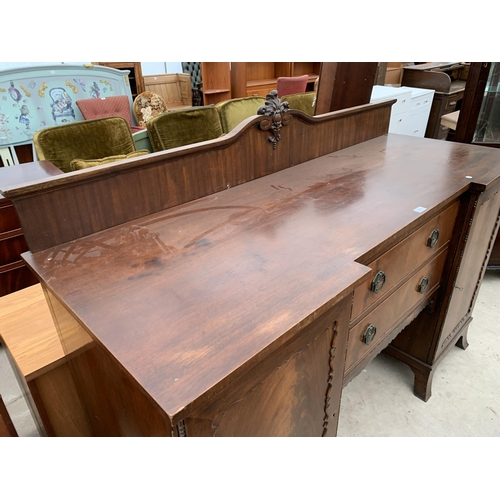 2763 - AN EDWARDIAN MAHOGANY PEDESTAL BREAKFRONT SIDEBOARD ENCLOSING TWO CUPBOARDS, ONE BEING A CELLARETTE ... 