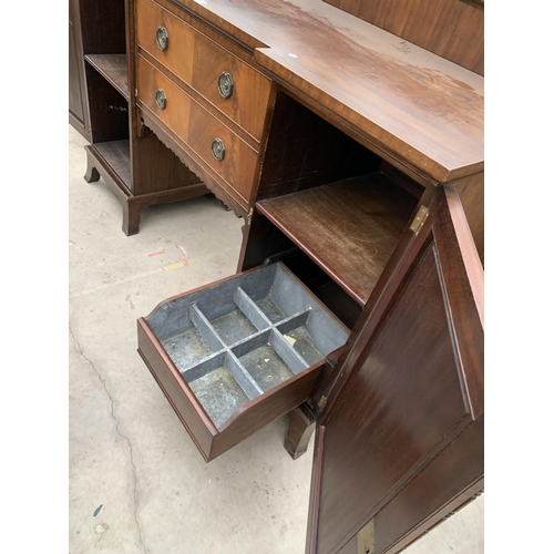 2763 - AN EDWARDIAN MAHOGANY PEDESTAL BREAKFRONT SIDEBOARD ENCLOSING TWO CUPBOARDS, ONE BEING A CELLARETTE ... 