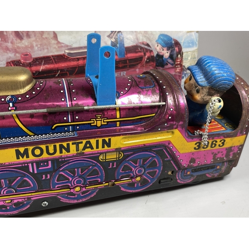 305 - A BOXED BATTERY OPERATED TIN RED MOUNTAIN EXPRESS BELL CLANGER TRAIN