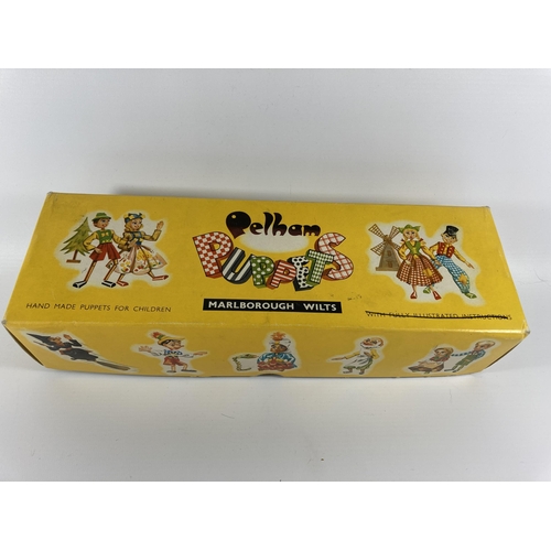 340 - A VINTAGE PELHAM PUPPET OF A GIRL IN A PELHAM BOX