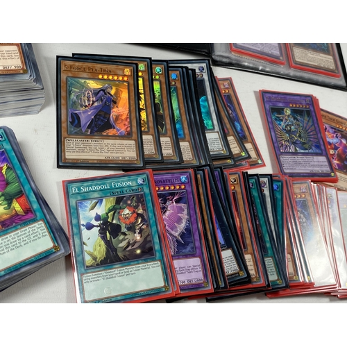 352 - A LARGE COLLECTION OF YU-GI-OH CARDS TO INCLUDE A FOLDER OF ASSORTED CARDS ETC