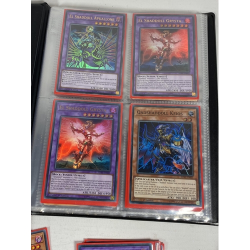 352 - A LARGE COLLECTION OF YU-GI-OH CARDS TO INCLUDE A FOLDER OF ASSORTED CARDS ETC