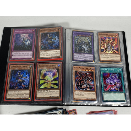 352 - A LARGE COLLECTION OF YU-GI-OH CARDS TO INCLUDE A FOLDER OF ASSORTED CARDS ETC