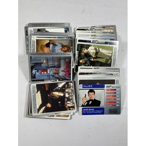 354 - A COLLECTION OF 140+ JAMES BOND 2002 007 SPY FILES TRADING CARDS