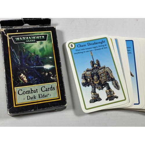 355 - A BOXED VINTAGE 1990'S WARHAMMER 40K DARK ELDER COMBAT CARD DECK AND FURTHER LATE 90'S WARHAMMER 40K... 