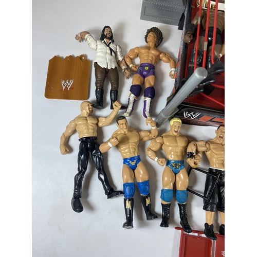 364 - A LARGE COLLECTION OF W.W.E WRESTLING FIGURES IN RING WITH BELTS ETC