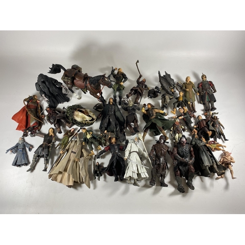 365A - A LARGE COLLECTION OF LORD OF THE RINGS FIGURES AND WEAPONS AND ACCESSORIES ETC