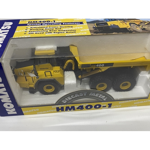 402 - A BOXED KOMATSU HM 400-1 ARTIC DUMP TRUCK REF NO 40014 SCALE 1:50