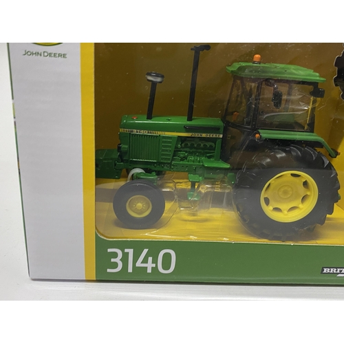 406 - A BOXED BRITIANS JOHN DEERE 3140 TRACTOR SCALE 1: 32