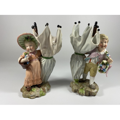 805 - A PAIR OF 19TH CENTURY DRESDEN STYLE CONTINENTAL HARD PASTE PORCELAIN FIGURES WITH CROSSED SWORD MAR... 