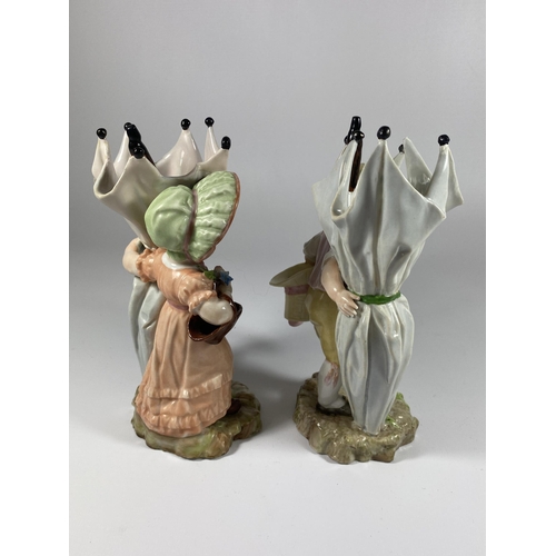 805 - A PAIR OF 19TH CENTURY DRESDEN STYLE CONTINENTAL HARD PASTE PORCELAIN FIGURES WITH CROSSED SWORD MAR... 