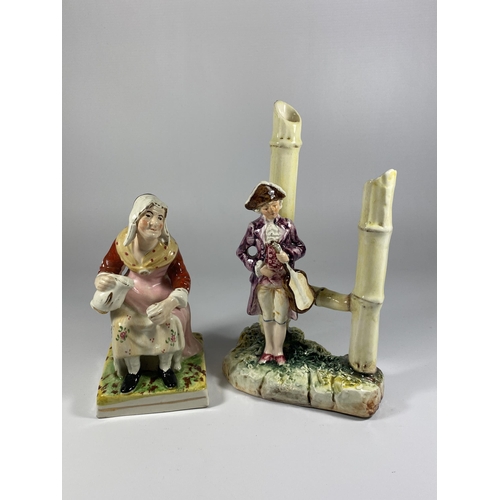 814 - A STAFFORDSHIRE LADY FIGURE PLUS A CONTINENTAL MAN