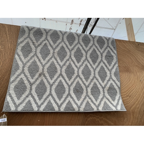 A MODERN GREY PATTERNED RUG