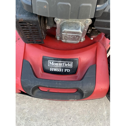 60 - A MOUNTFIELD HW531 PD PETROL LAWN MOWER WITH GRASS BOX BELIEVED IN WORKING ORDER BUT NO WARRANTY GIV... 