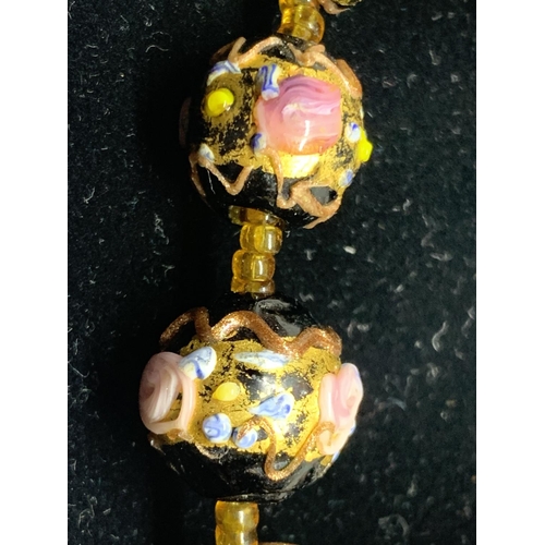 531 - AN ENAMEL HANDPAINTED NECKLACE IN A PRESENTATION BOX