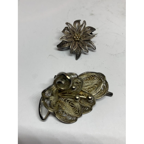 550 - FOUR SILVER BROOCHES