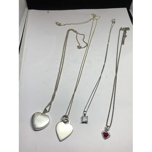 552 - FOUR SILVER NECKLACES WITH PENDANTS